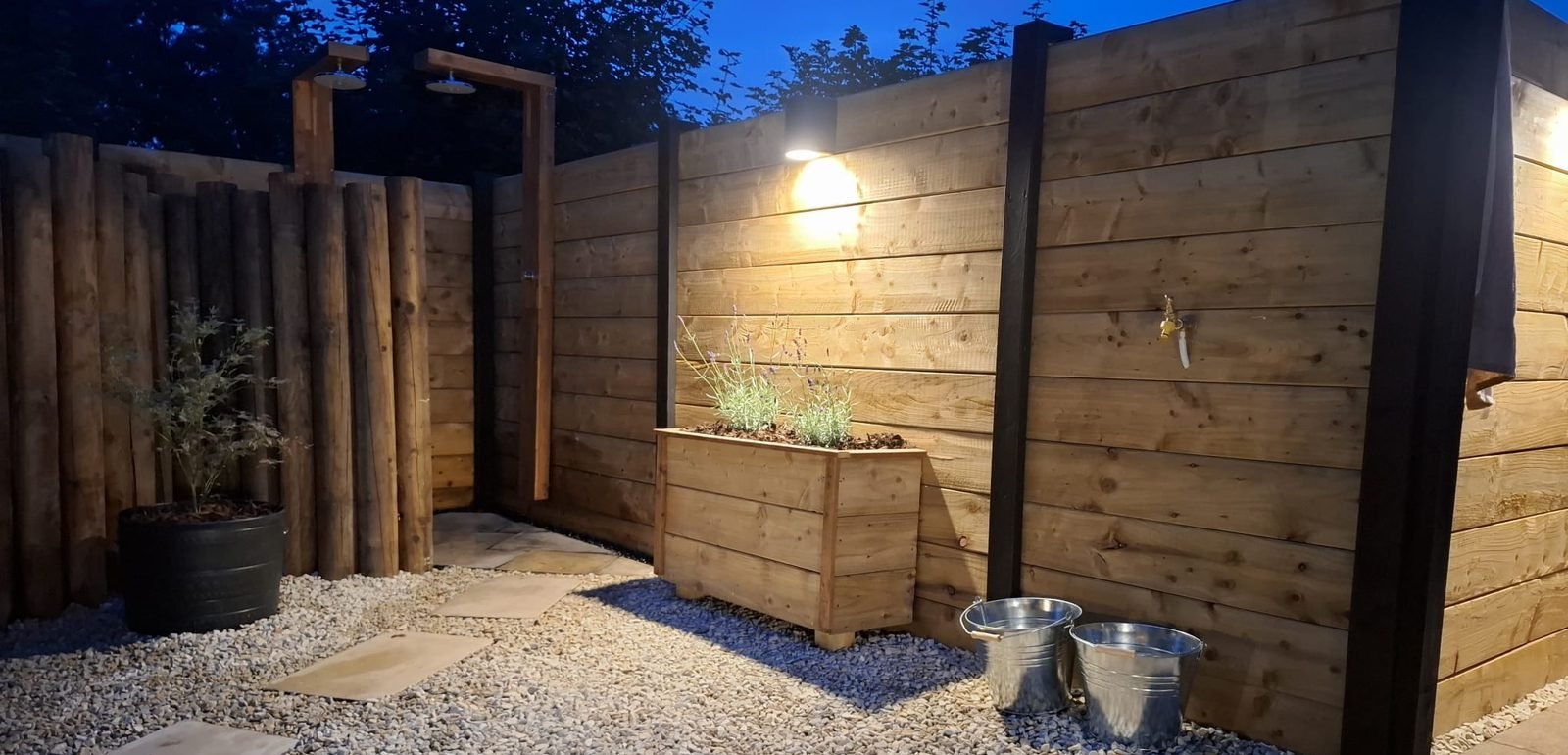 Courtyard at dusk at B & M Saunas
